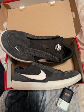 Nike Men’s Black Suede Sneakers with White Swoosh
